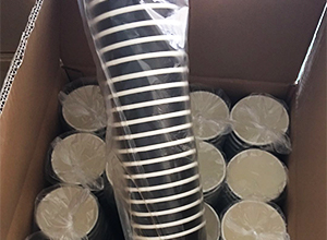 Paper cups in plastic packaging